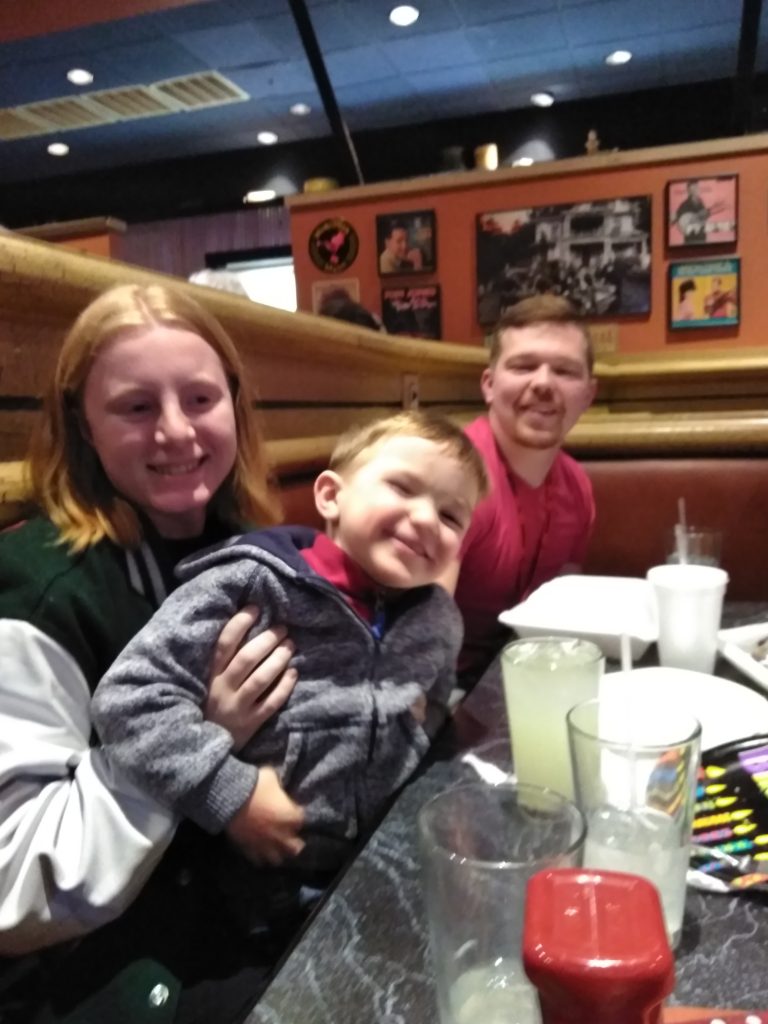 Family eating dinner at a restaurant together