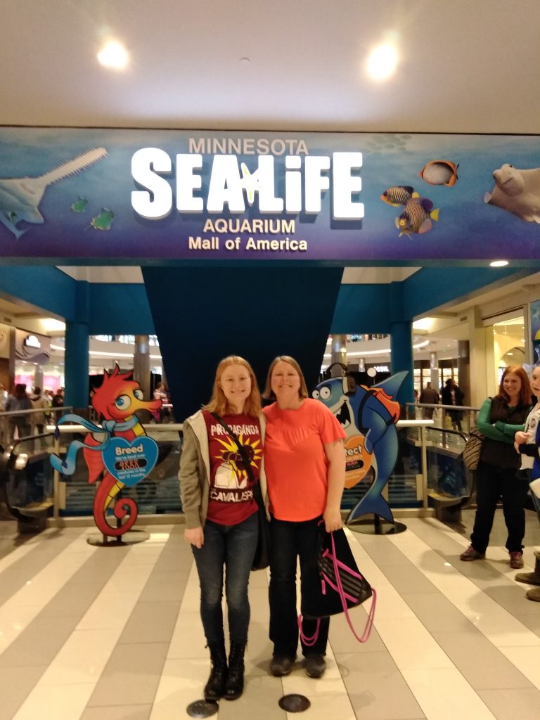 Mom and daughter by Sea Life in Mall of America