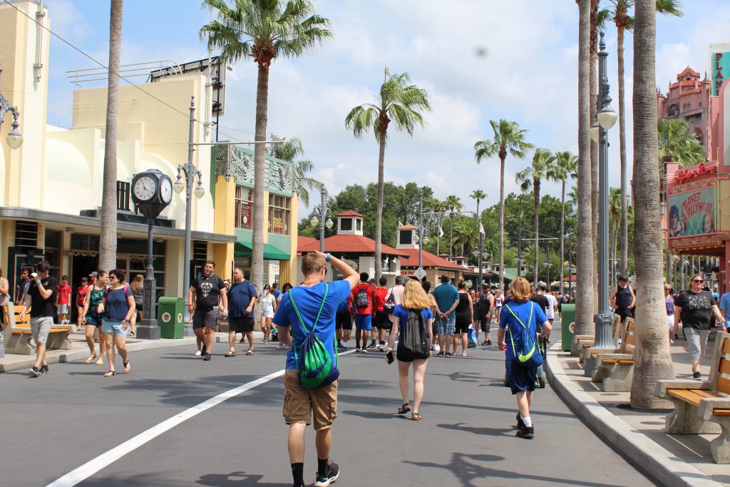 Adolescents at Disney's Hollywood Studios walking towards the Tower or Terror