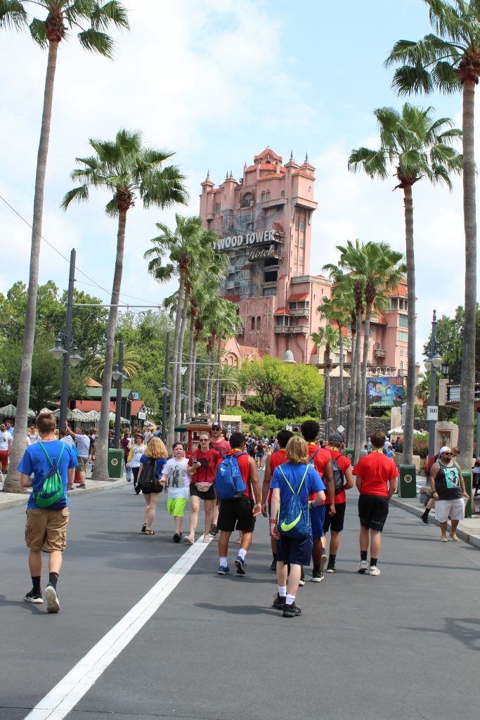 Adolescents at Disney's Hollywood Studios walking towards the Tower or Terror