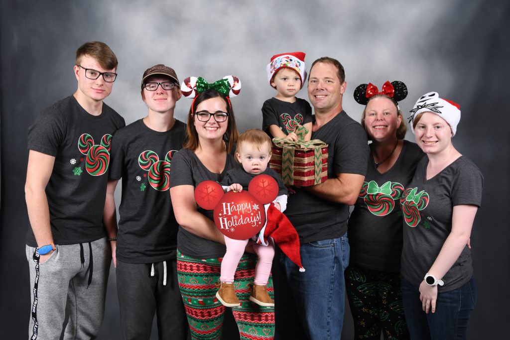 Christmas family photo at Disney Springs