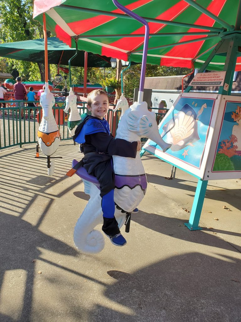 Holiday World Amusement Park child on seahorse ride