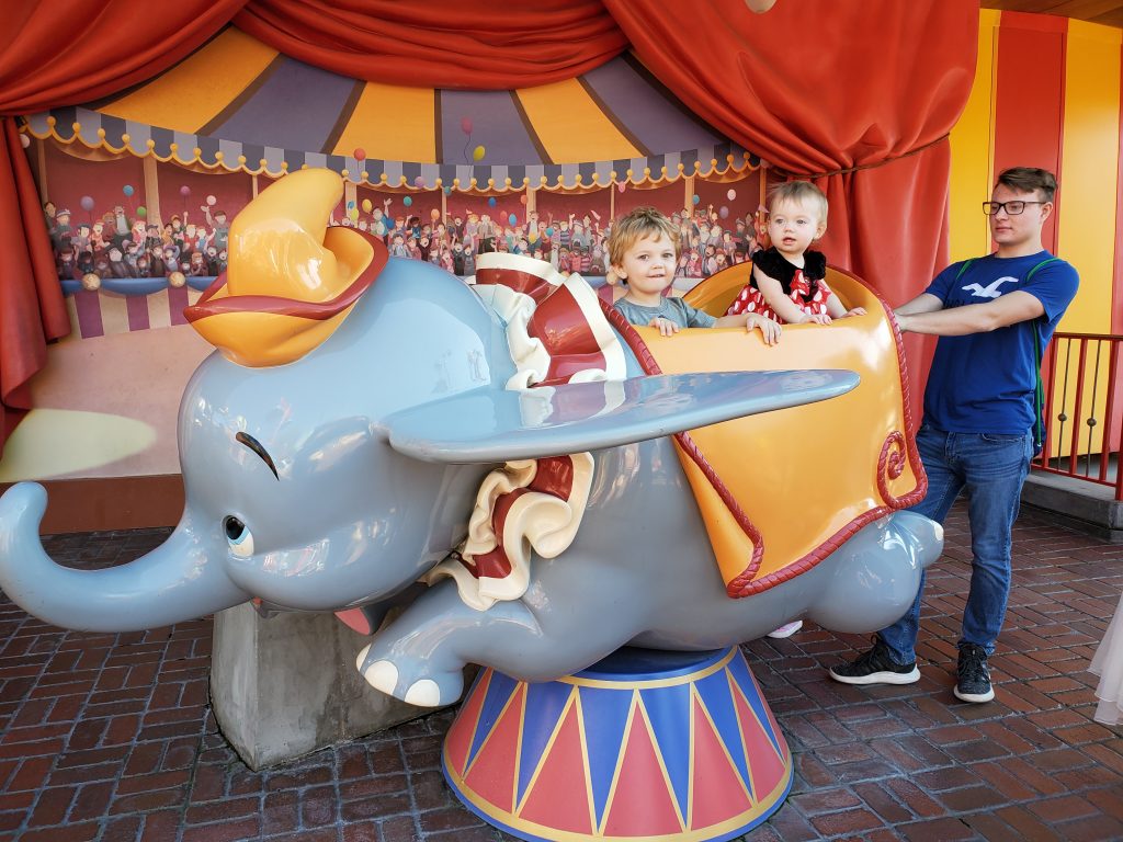 Kids at Magic Kingdom at Dumbo ride