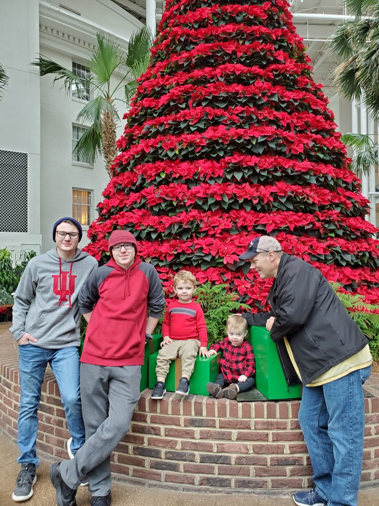 Family with Christmas tree