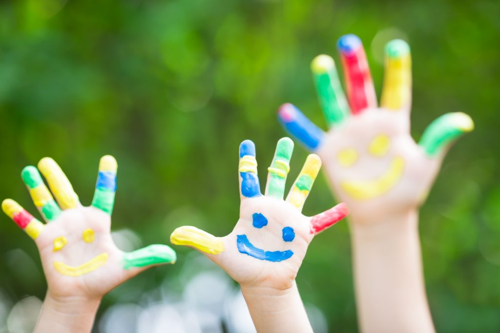 kids painting and playing